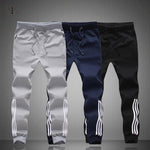 Printemps été hommes pantalons mode pantalon de survêtement maigre hommes Joggers rayé mince ajusté pantalons gymnases vêtements grande taille 5XL Harem pantalon