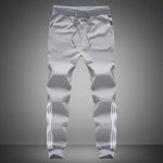 Printemps été hommes pantalons mode pantalon de survêtement maigre hommes Joggers rayé mince ajusté pantalons gymnases vêtements grande taille 5XL Harem pantalon