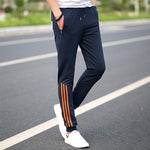 Printemps été hommes pantalons mode pantalon de survêtement maigre hommes Joggers rayé mince ajusté pantalons gymnases vêtements grande taille 5XL Harem pantalon