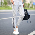 Printemps été hommes pantalons mode pantalon de survêtement maigre hommes Joggers rayé mince ajusté pantalons gymnases vêtements grande taille 5XL Harem pantalon