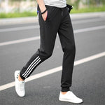 Printemps été hommes pantalons mode pantalon de survêtement maigre hommes Joggers rayé mince ajusté pantalons gymnases vêtements grande taille 5XL Harem pantalon